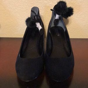 Black microsuede pumps